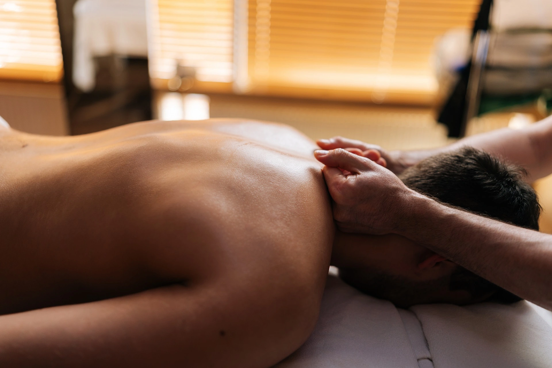 a man receiving a back massage