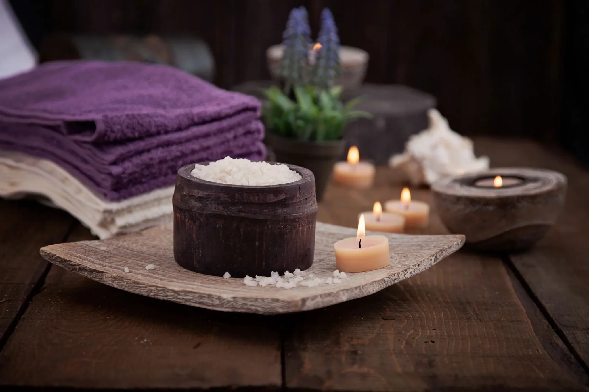 a candle and candles on a plate