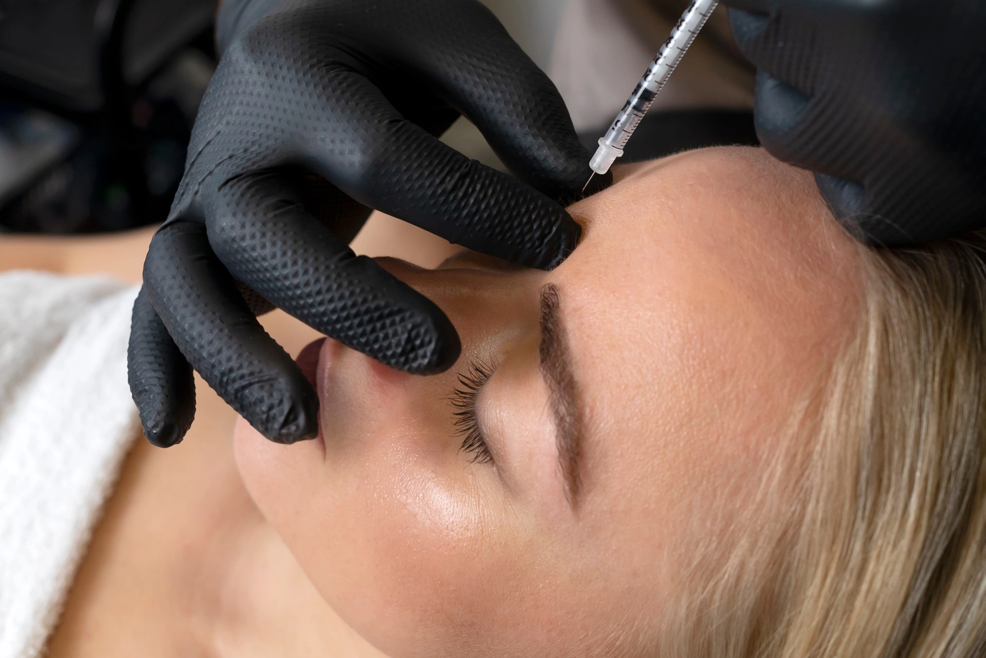 a woman receiving an injection