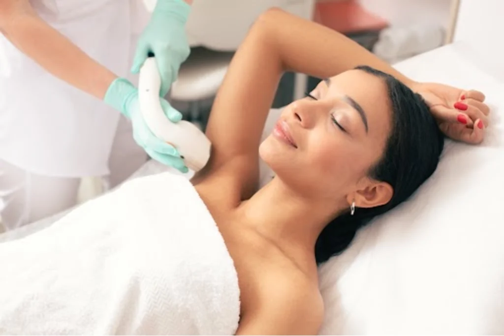 a woman receiving laser hair removal