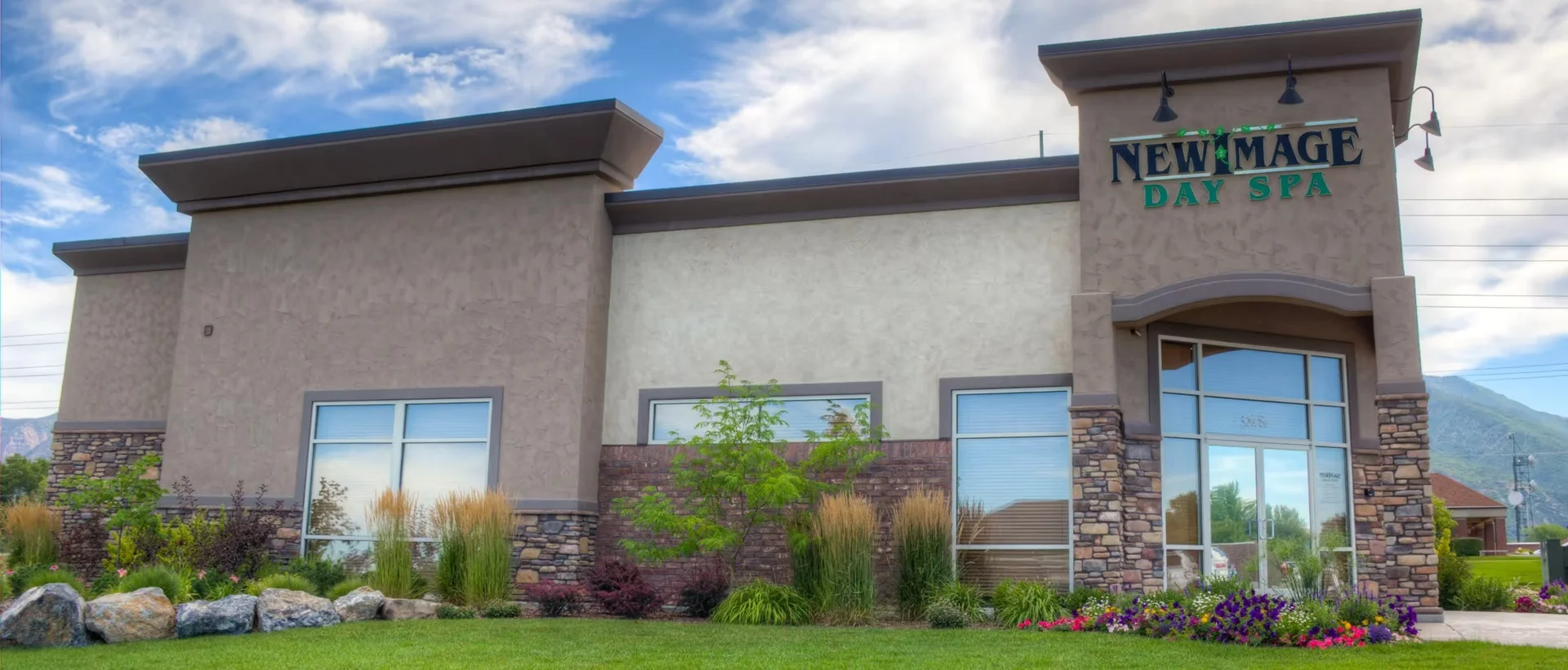 a building with a lawn and grass